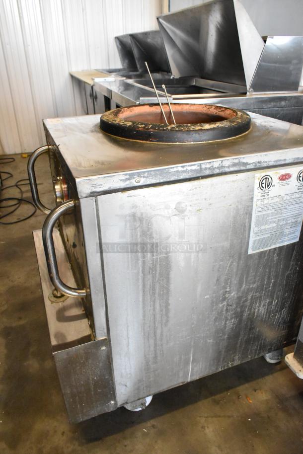 Puri PTL-102 stainless steel commercial tandoori oven, natural gas, 51,500 BTU, visible labels, sturdy handles.