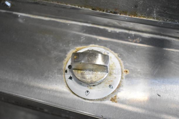 Close-up of the control knob on a Puri PTL-102 Stainless Steel Commercial Tandoori Oven, showing temperature settings.