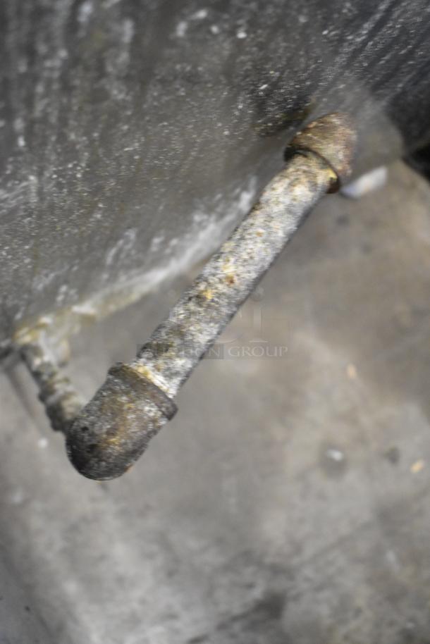Puri PTL-102 Tandoori Oven pipe showing signs of rust and wear, indicating used condition.