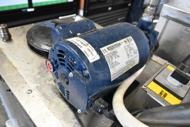 2024 Frontline stainless steel commercial oil caddy with Haight motor. Features visible include control panel and labels.