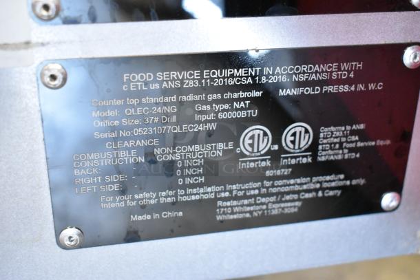 Qualite QLEC-24/NG stainless steel commercial charbroiler grill, natural gas, 60,000 BTU, model and safety label shown.