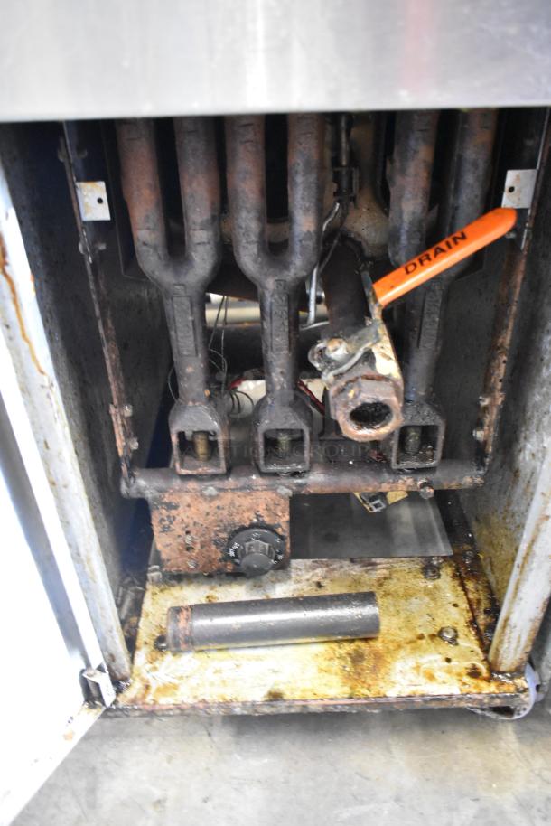 Dean SR42GNS stainless steel gas fryer, 105,000 BTU. Interior view shows wear and an orange "DRAIN" handle.