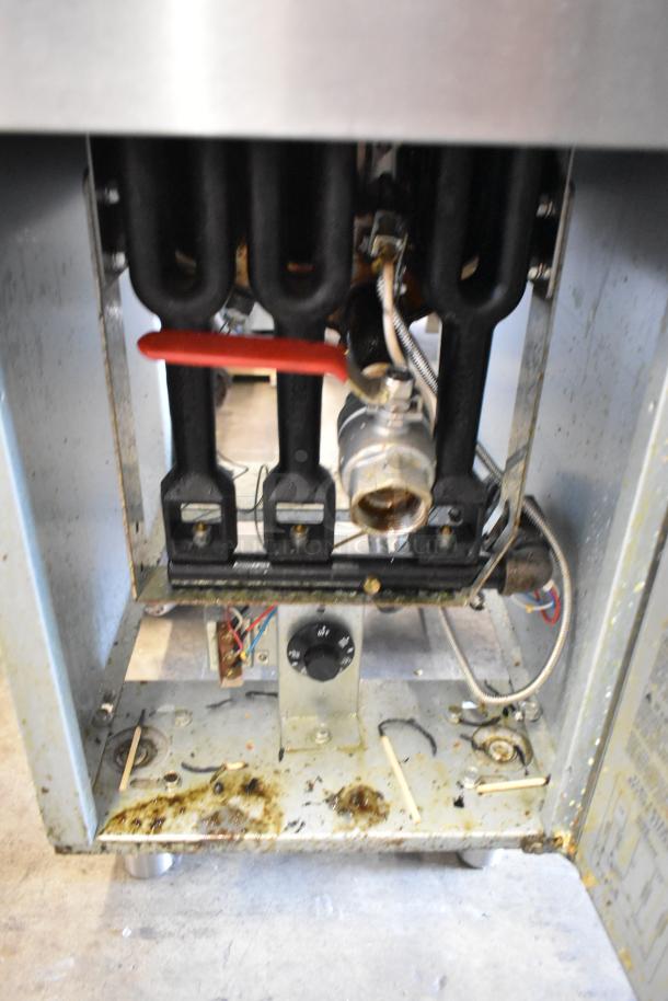 2021 Avantco FF300-N natural gas fryer, stainless steel, 90,000 BTU, visible piping and connectors, moderate wear.