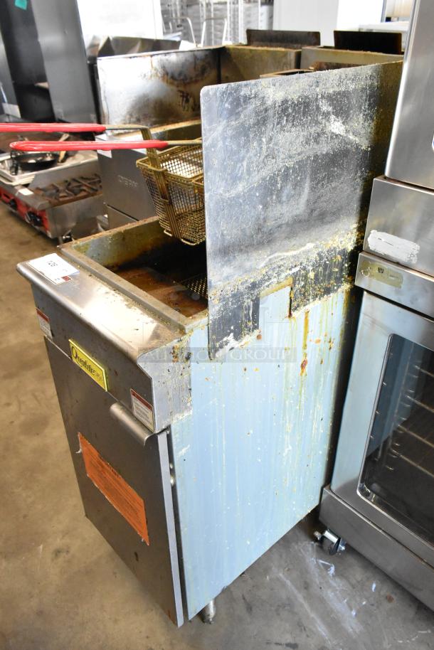 2022 Qualite GF-90/NG stainless steel deep fat fryer, 90,000 BTU, with 2 metal fry baskets and side splash guard, used condition.