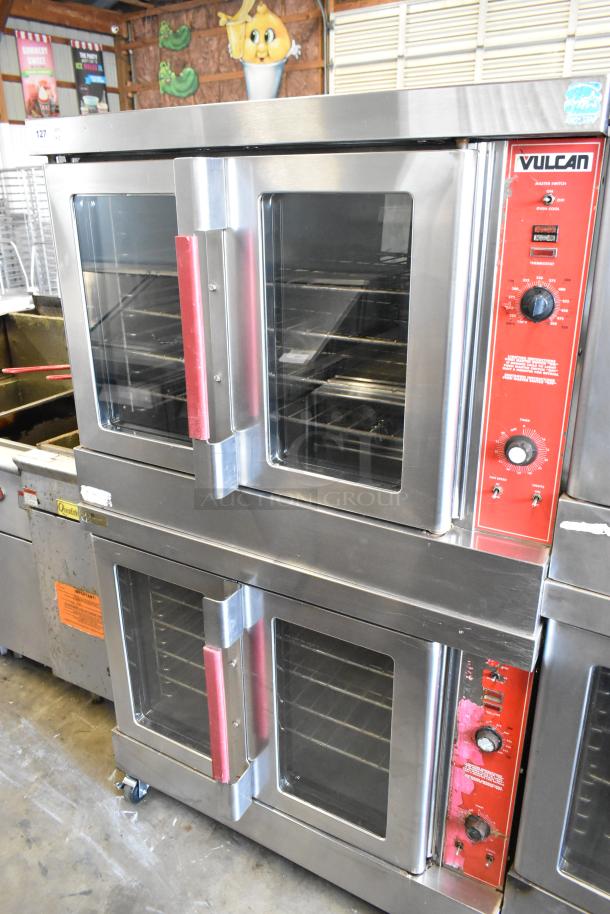 Vulcan VC6GD-SEFCAM stainless steel convection oven, dual units, view-through doors, metal racks, thermostatic controls, on casters.