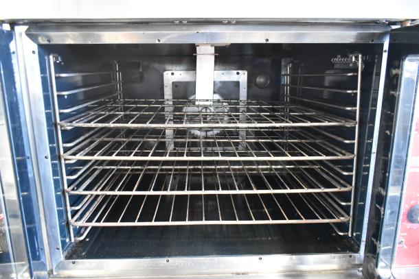 Vulcan VC6GD-SEFCAM convection oven, stainless steel, full size, view-through doors, metal racks, thermostatic controls.
