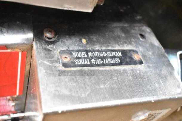 Stainless steel plate showing Vulcan oven model VC6GD-SEFCAM and serial number 48-1650559.