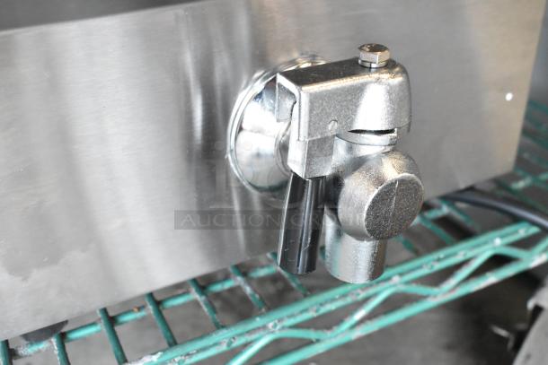 Close-up of the Avantco 177F200 electric countertop fryer control valve, showcasing its metallic finish.