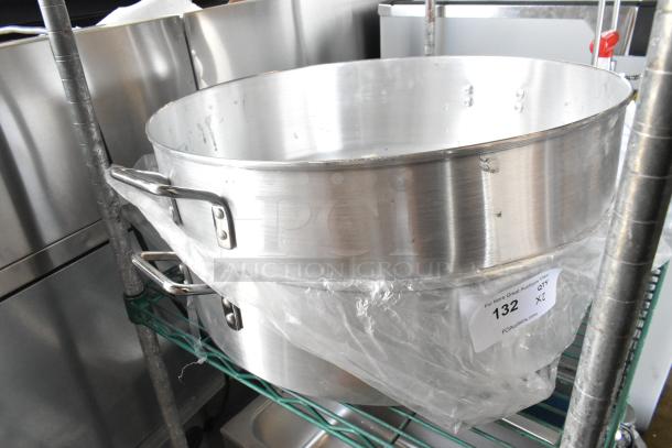 Town 34622 40 Qt. Aluminum Steamer Water Pan, brand new with minor scratches and dents, includes packaging and auction label.