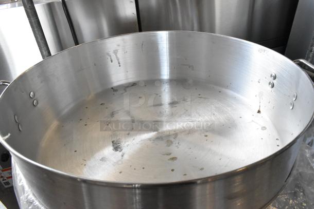 2 Town 34622 40 Qt. aluminum steamer water pans, new condition with minor scratches.
