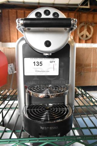 Brand new Nespresso Zenius espresso machine, 120V, single-serve, scratch and dent condition, visible label reading "135."