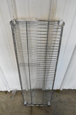 Chrome finish wire shelf, large rectangular design, new condition, with sturdy metal rods and secure corner attachments.