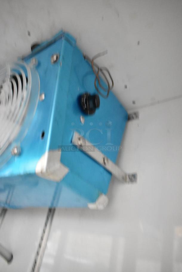 Universal Coolers metal 2-door reach-in cooler, 115 volts, commercial use, shown with interior fan and wiring detail.