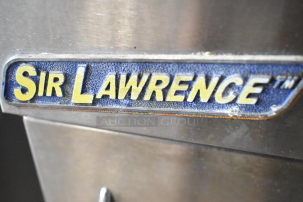 Stainless steel deep fryer with a "Sir Lawrence" label, Pitco Frialator 40C, natural gas, 105,000 BTU, commercial use.