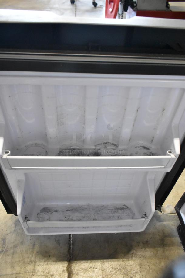 IndelB SP825 Mini Cooler, model A22-73004-000. 12/24V DC, open interior view, white, shows some wear and dirt.
