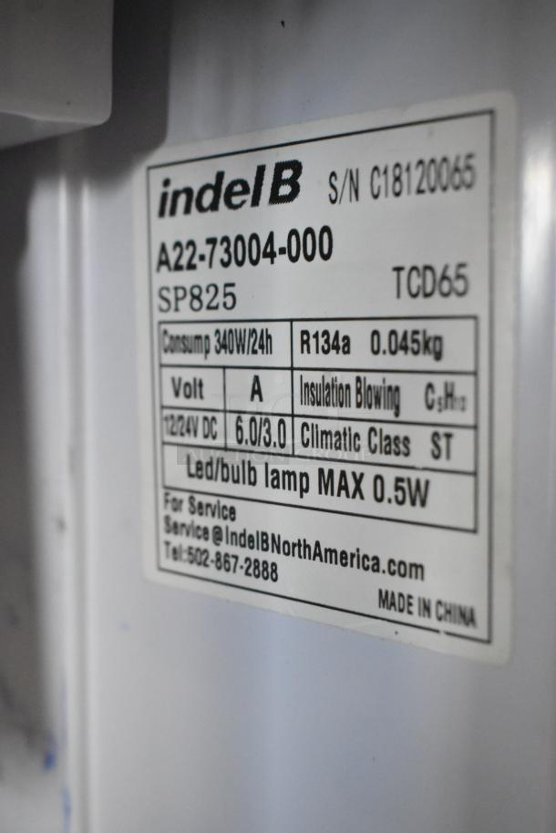 IndelB A22-73004-000 SP825 Mini Cooler label, showing 12/24V DC, 340W/24h consumption, R134a refrigerant, made in China.