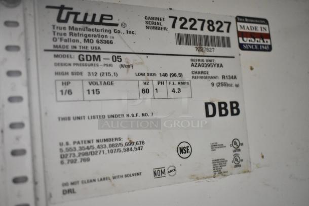 True GDM-05 Metal Mini Cooler Merchandiser label, showing 115V, 1 Phase, Made in USA, model details, and certifications.