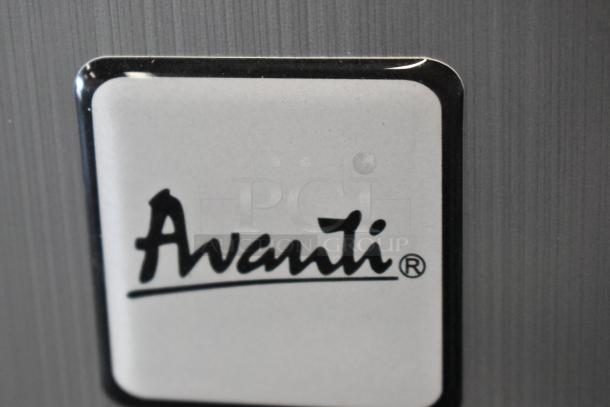 Avanti cooler with chrome finish, includes freezer. Powered by 115 volts, 1 phase. Brand logo visible on surface.