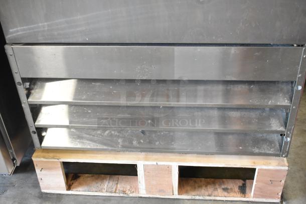 Brand new 2024 Avantco 178A19FHC stainless steel reach-in freezer. Single door, 115V, 1 phase, slight scratches visible.