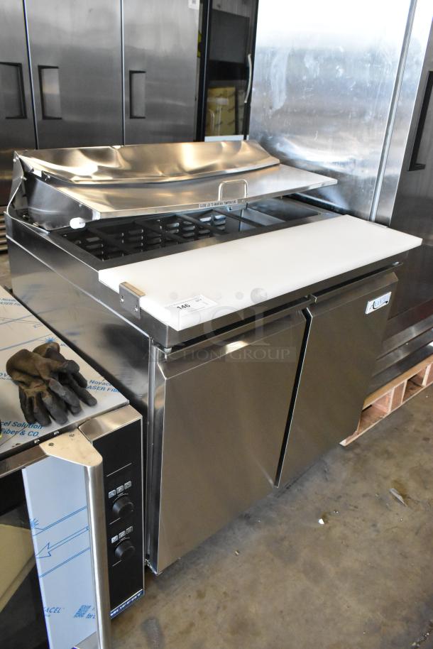Brand new Avantco 178SSPT36HC stainless steel commercial sandwich salad prep table with bain marie mega top and casters.