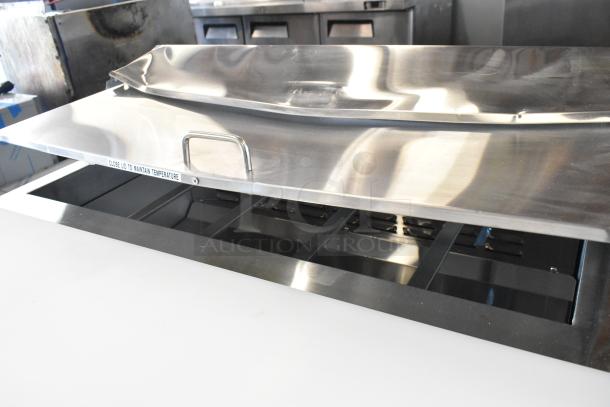 Brand new Avantco 178SSPT36HC stainless steel sandwich salad prep table, scratch and dent. Bain Marie top, commercial casters.