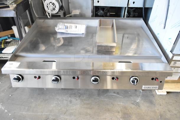 Brand new Garland stainless steel commercial gas griddle, countertop model. Slight scratches and dents, includes manual.