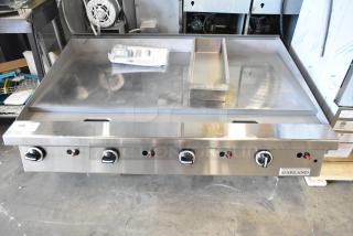 Brand new Garland stainless steel commercial gas griddle, countertop model. Slight scratches and dents, includes manual.