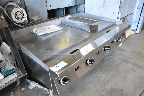 Garland stainless steel commercial countertop gas-powered flat top griddle, brand new with minor scratches and dents.