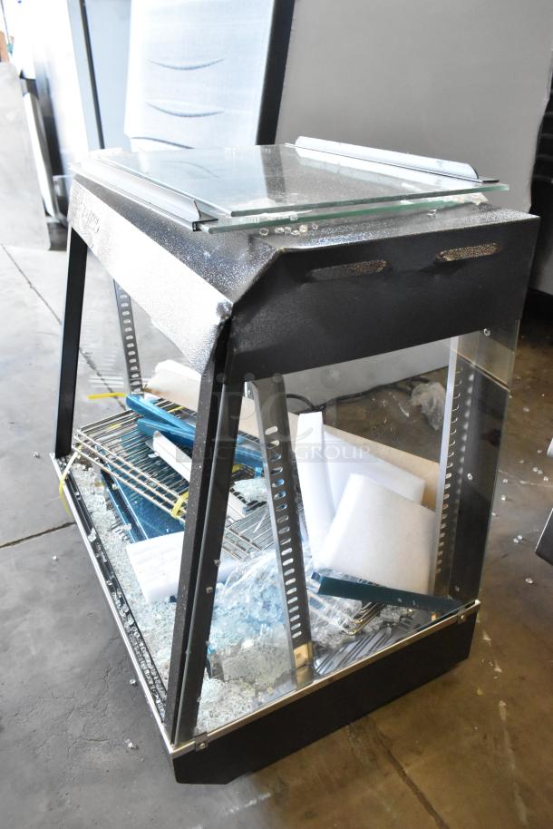 Brand new Avantco 177HDC26 heated display case with damaged glass; 26", 3 shelves, sliding doors, 120V, 1 phase.
