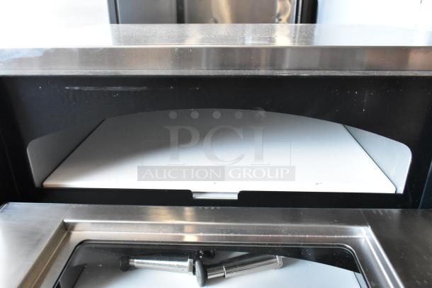 Brand new Waring WPO350 stainless countertop double pizza oven with cooking stones; 240 volts, 1 phase, minor scratches.