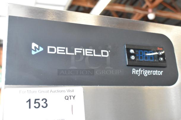 Brand new Delfield GBSR1P-S stainless steel single door reach-in cooler, commercial casters, 115V, scratch and dent.
