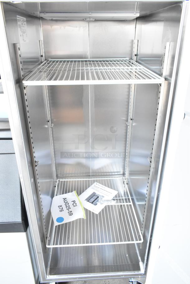 Stainless steel Delfield GBSR1P-S commercial single door cooler on casters, 115V. Interior shelves shown. Scratch and dent condition.