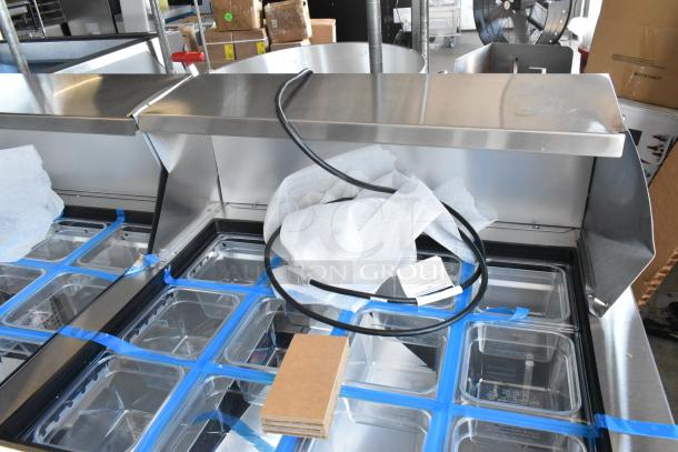 Brand new 2025 True TSSU-72-30MB-ST-HC stainless steel sandwich salad prep table, scratch and dent condition.