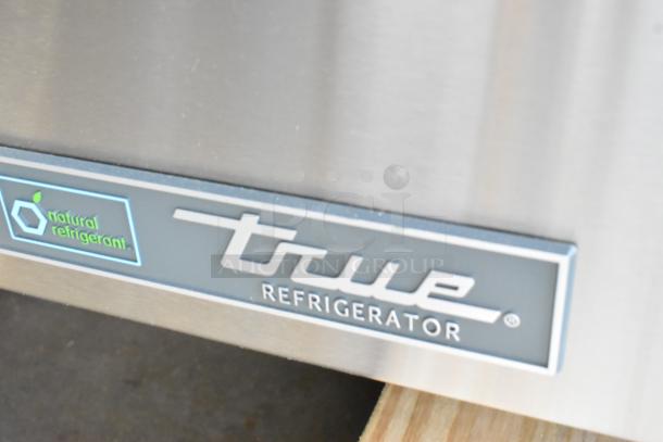 True TSSU-72-30MB-ST-HC stainless steel prep table, sign shows "natural refrigerant" marking. Brand new, minor scratches.