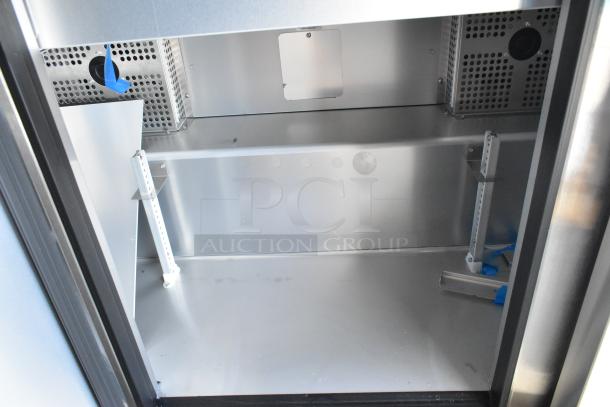 Brand new True TSSU-72-30MB-ST-HC stainless steel sandwich prep table interior, scratch and dent condition, 115V.