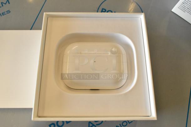 Apple MWP22AM/A AirPods Pro in wireless charging case, visible wear on case, in original packaging.