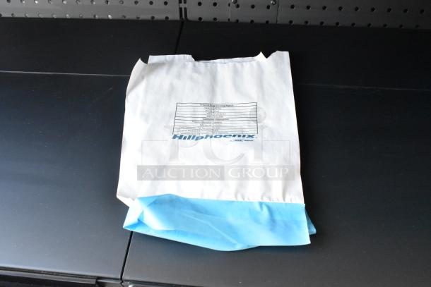 Hill Phoenix merchandiser packaging on black surface, showing setup programming report. Model 288856PF8R51.