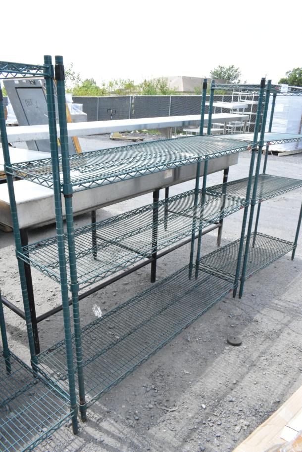 Green finish 3-tier wire shelving unit, sturdy and spacious. Buyer must dismantle; consider freight charges.