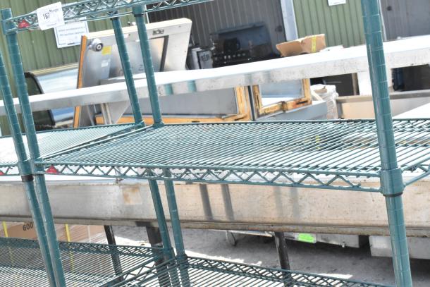 Green finish 4-tier wire shelving unit, used. Buyer must dismantle. Consider freight charges due to size and weight.