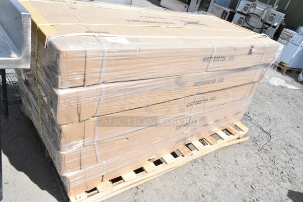 Stack of 5 boxes containing new Regency 600TSB3072S stainless steel work tables with 4" backsplash, on a pallet, wrapped in plastic.