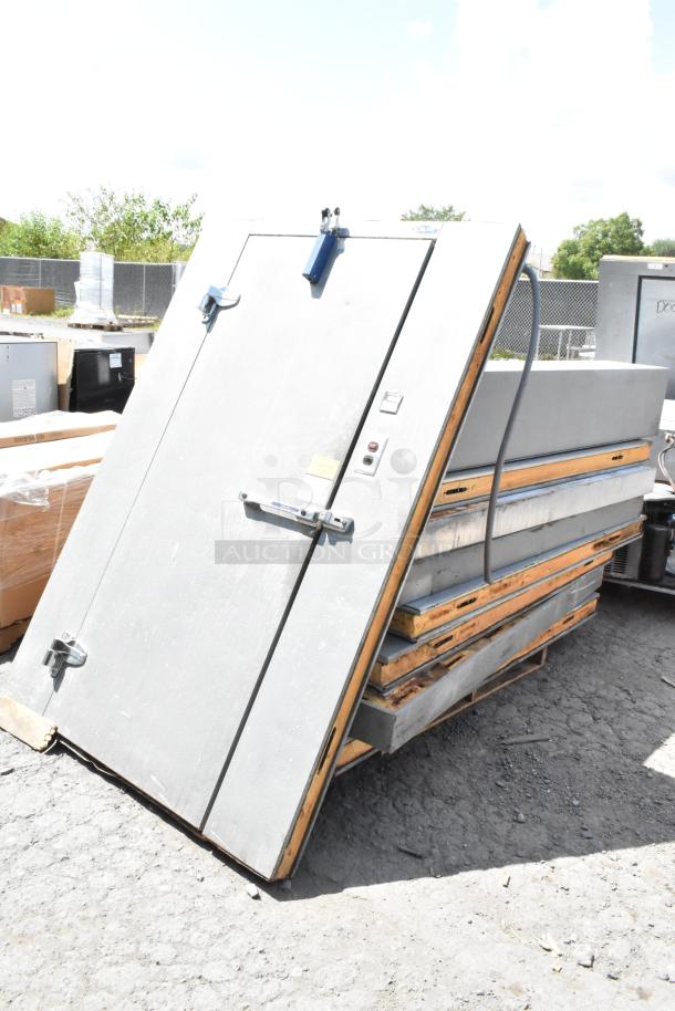 Norlake self-contained walk-in freezer box with Tecumseh compressor and Norlake condenser, disassembled, outdoor condition.