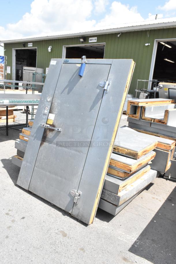 Norlake self-contained walk-in cooler box with compressor and condenser, shown dismantled. Used condition.