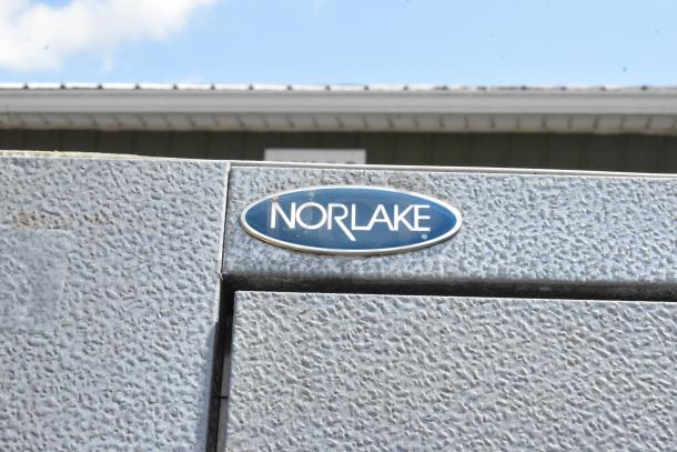 Norlake Walk-In Cooler Box with compressor and condenser, gray textured surface, Norlake logo visible.