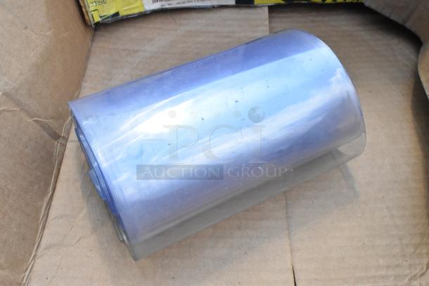 Brand new plastic strip curtain roll, slight scratch and dent, transparent, in box for auction.