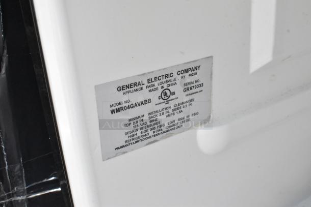 Label on General Electric mini cooler, model WMR04GAVABB, showing specifications and made in China.