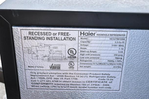 Label on Haier HC32TW10SB cooler, showing model, capacity of 3.2 cu.ft., voltage, and dimensions.