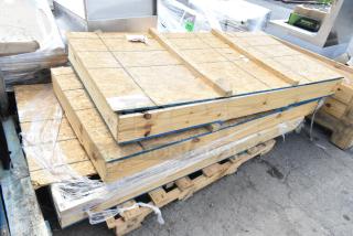 Brand new items in crates, including Hussmann 3201478BX glass door, ready for auction. Three items available, mint condition.