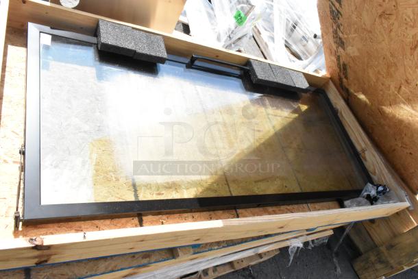 Brand new Hussmann 3201478BX glass door, framed, in crate. Excellent condition, protective foam in place.