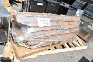 6 new scratch and dent items on pallet, including Regency utility sink, wire security cage, chrome shelving post. Sealed packaging with labels.