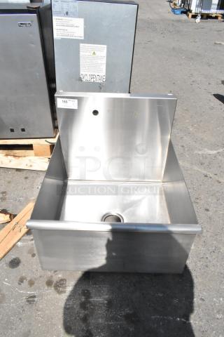 Brand new Regency stainless steel single bay sink, no legs. Scratch and dent condition, visible label with product number.